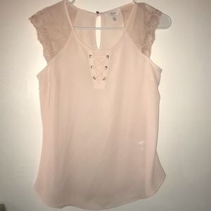 Light pink sleeveless blouse